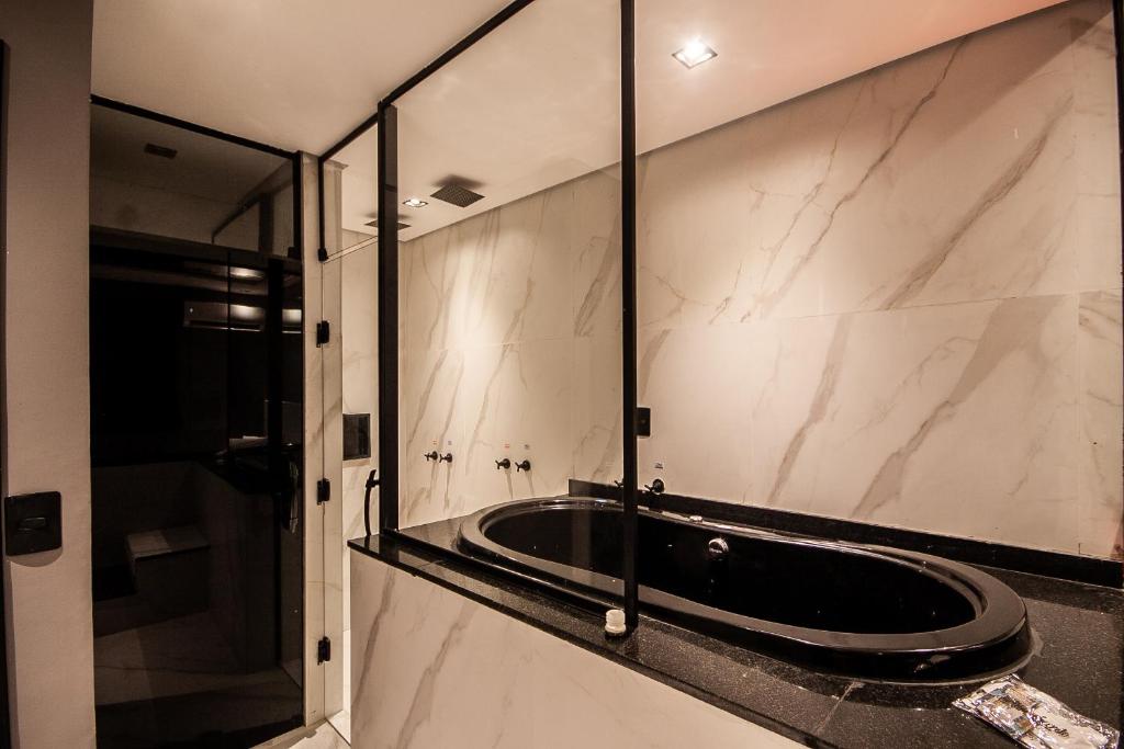 Motel Jardim Secreto Santo André com Jacuzzi no Quarto