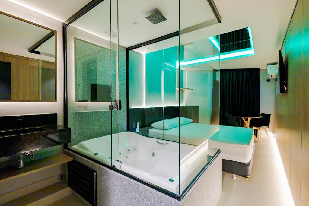 Quarto com Hidro Drops Express Motel Curitiba